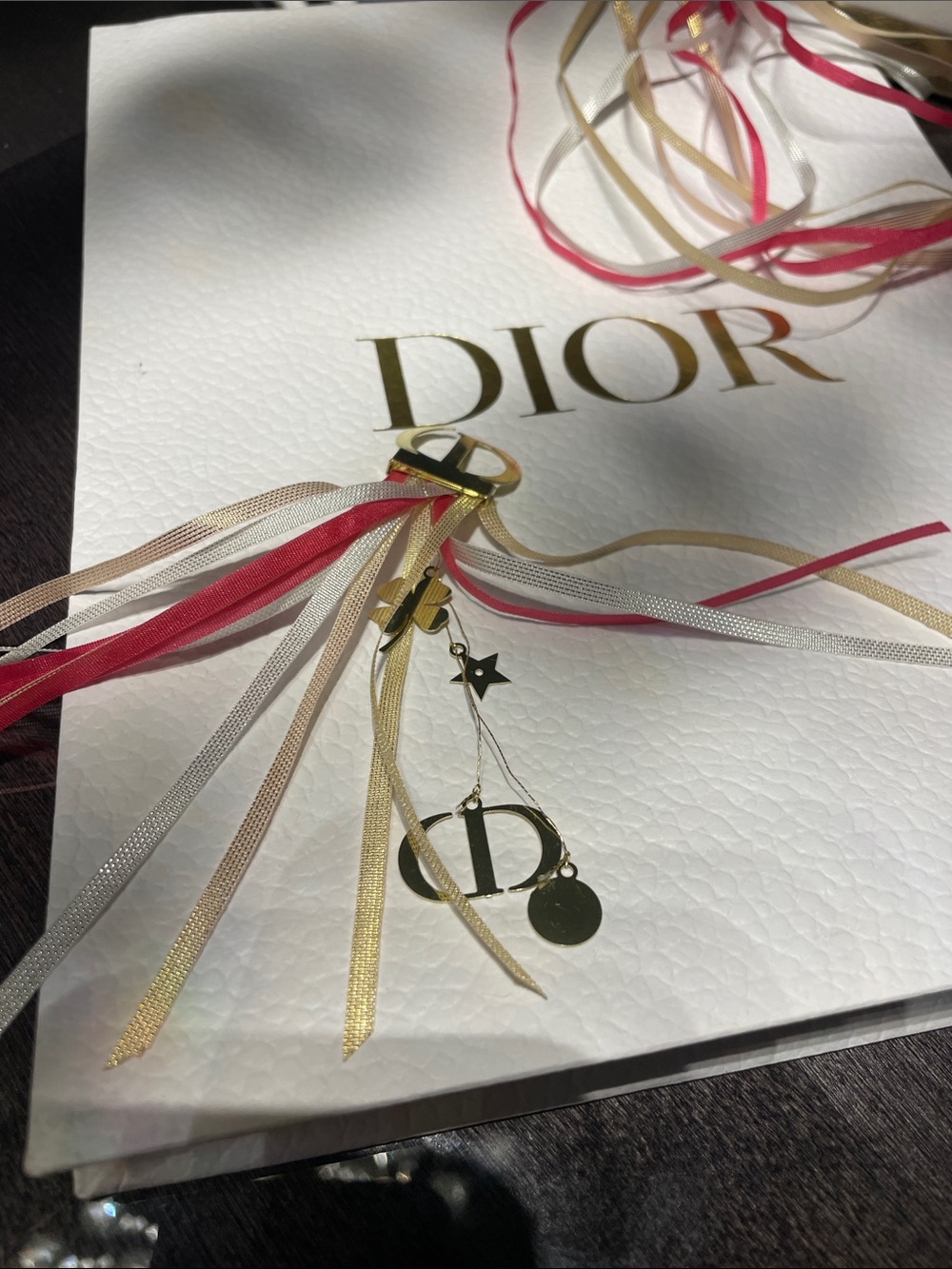 Dior new gold metal charm keychain ribbon